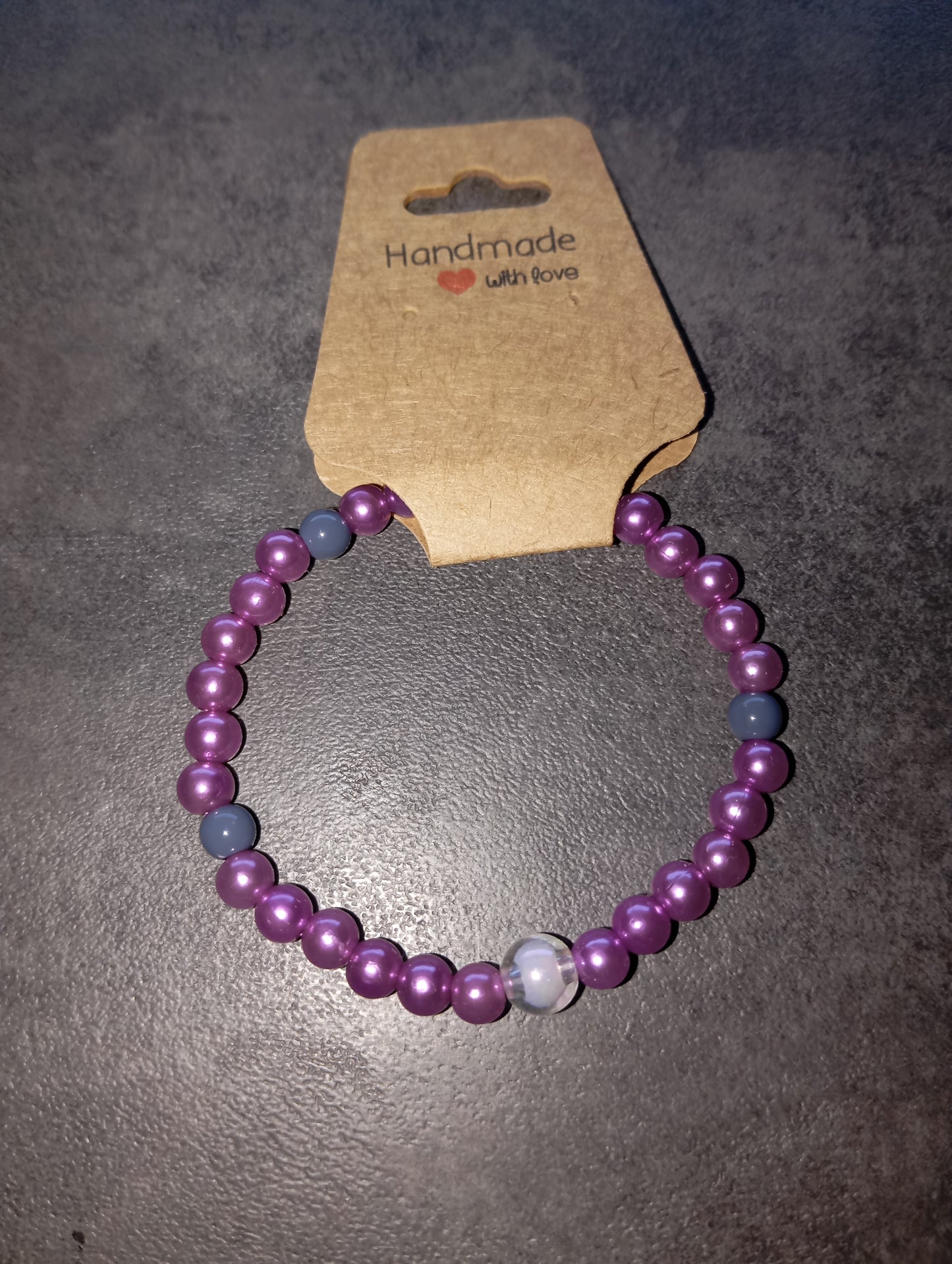 Armband lila mit Kugel