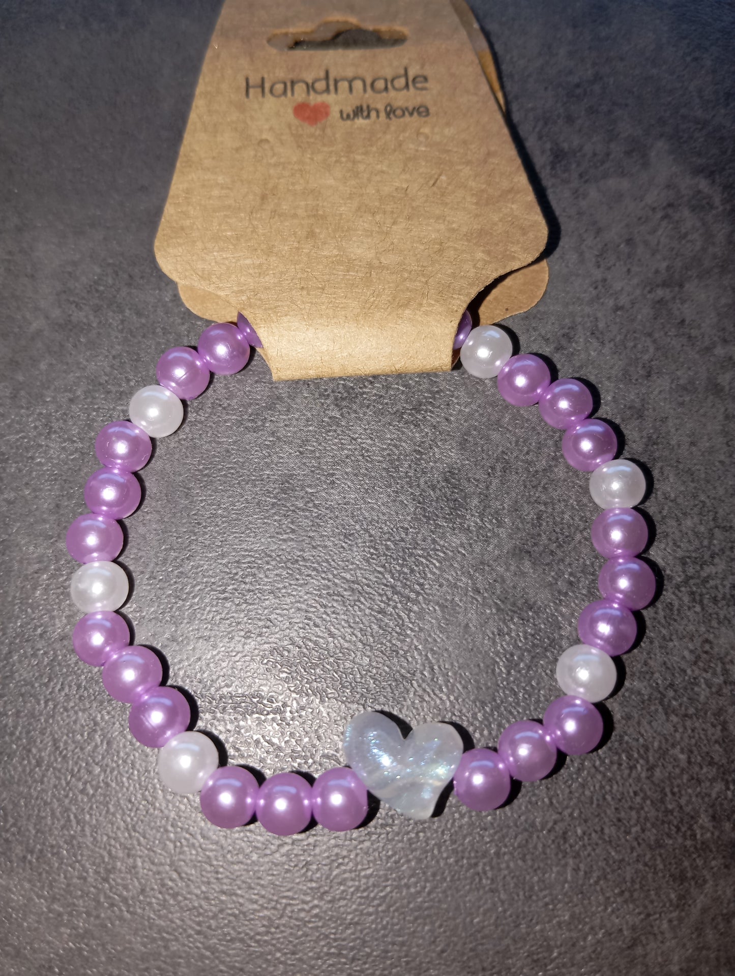 Armband lila mit Herz ❤️
