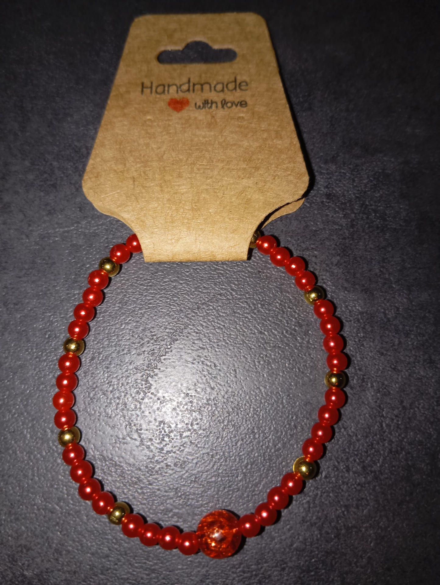 Armband rot mit roter Kugel
